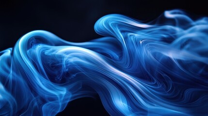 Fototapeta premium Abstract blue smoke swirling gracefully against a dark backdrop, creating a mesmerizing visual effect for creative projects