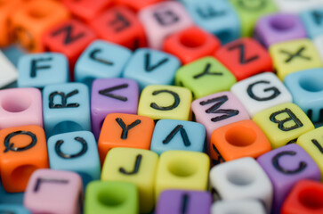 Multicolored Alphabet Blocks for Spelling and Creativity