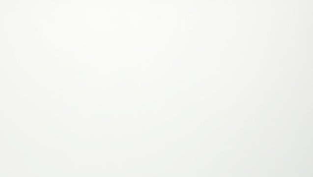 An underexposed image featuring a textured white surface, providing a subtle background or simple canvas.