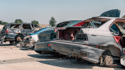 destroyed and burned cars in the city in Ukraine