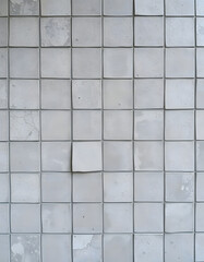 Old gray grey worn grunge vintage shabby patchwork motif tiles stone concrete cement wall wallpaper texture background banner panorama, professional photography. with white shades