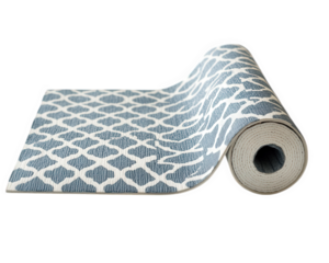 Stylish gym mat with unique patterns, rolled out for exercise or yoga. Its vibrant design adds modern touch to any workout space, enhancing motivation and comfort