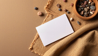 Mockup Elegant business card on rustic burlap setting, natural sophistication