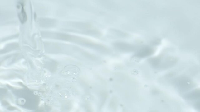 White distilled vinegar is poured macro slow motion