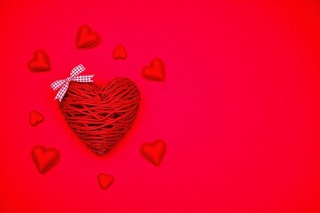 Solid red bg woven red twig heart checkered ribbon