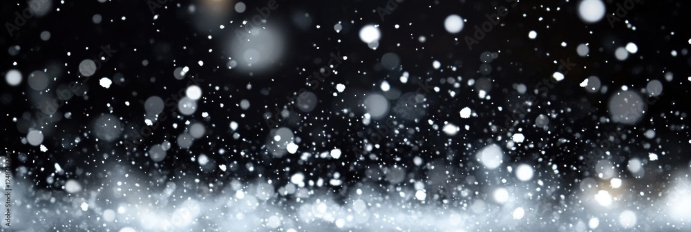 Poster snowflakes gently falling on a dark background with bokeh effect creating a dreamlike and ethereal a
