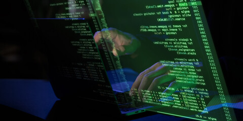 Dark setting with glowing green holographic screen displaying fictional coding interface. Hands interacting with digital elements, representing cybersecurity, hacking, and AI development.
