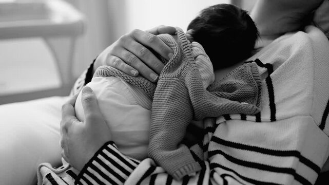 Maternal Lifestyle in Monochrome - Tired Mother Asleep with Newborn on Chest in Black and White