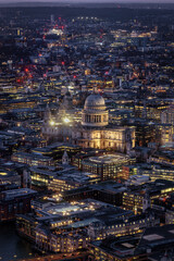 Elevated view of the illuminated St. Pauls Cathedral durubg evening time, London, England