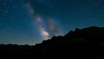 Milky Way at night over the mountains, Side lit. with white shades