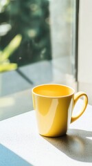 Radiant Yellow Mug Under Morning Sunlight