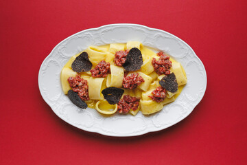 Italian pasta, calamarata with truffle and tartare