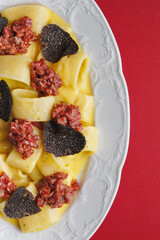 Italian pasta, calamarata with truffle and tartare