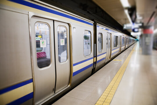 Subway train and platform, Tokyo, Japan.