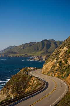 California Highway 1 at milepost 59 on the Big Sur coast in the evening near Carmel, California, USA.
