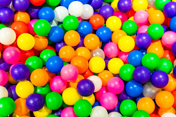 A colorful collection of plastic balls creating a fun-filled ball pit.