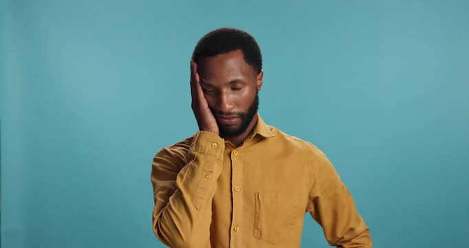 Studio, black man or facepalm with regret for mistake, startup fail or bad decision for designer. Mockup space, male person or entrepreneur with hand for shame emoji, disappointed or blue background