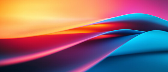 Abstract Gradient Waves with Vibrant Colors in Blue, Orange, and Pink Creating a Smooth Flowing Texture
