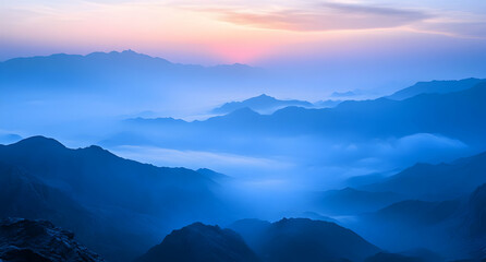 Fototapeta premium Serenity Unveiled, A Dreamlike Vista of Misty Mountains Bathed in Early Morning Hues, Evoking Tranquility and a Sense of Awe