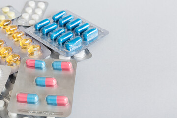 too many different pill of various blisters with different pills Medicines storage at home concept Medication storing. A pile of medicine in blister packs. Pharmaceutical blister packs