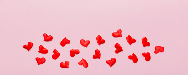 Valentine day background with red hearts, top view with copy space