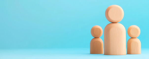 A minimalistic representation of three wooden figures on a blue background, symbolizing community, teamwork, or collaboration.