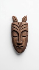 A carved wooden mask featuring delicate facial features and stylized plant motifs, showcasing artistry and cultural significance.