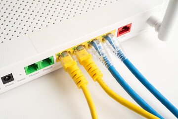 Ethernet cable with wireless router connect to internet service provider internet network.
