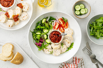 Chicken breast with cheese, baked in the oven on a white background. Diet food.