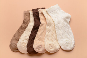 Basic color socks on beige background
