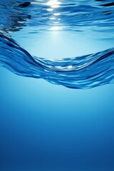 a close up of a wave in the ocean with sun shining