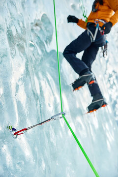 Ice climbing gear on the frozen waterfall