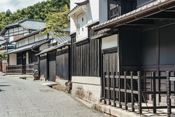 Empty street with traditional houses in Arashiyama, Japan.