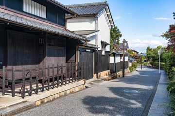 Empty street with traditional houses in Arashiyama, Japan.