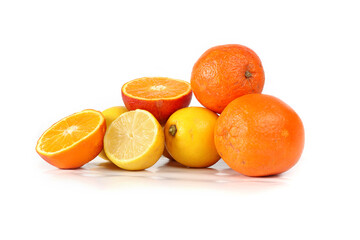 assortment of oranges and lemons isolated on a white background