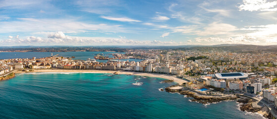 A Coruna city, aerial perspective. Old historic center of the city.  Panoramic aerial view of all Region. Famous travel destination in Galicia, northwest of Spain. Promenade and beach area of the city