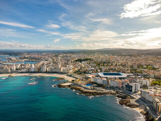 Fototapeta premium A Coruna city, aerial perspective. Old historic center of the city. Panoramic aerial view of all Region. Famous travel destination in Galicia, northwest of Spain. Promenade and beach area of the city