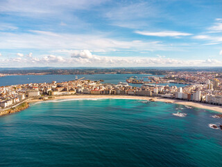 Naklejka premium A Coruna city, aerial perspective. Old historic center of the city. Panoramic aerial view of all Region. Famous travel destination in Galicia, northwest of Spain. Promenade and beach area of the city