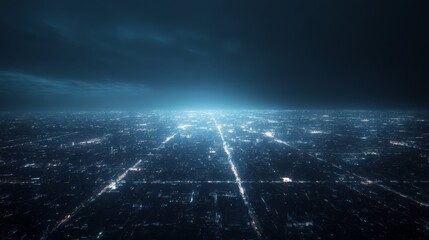 City lights create a mesmerizing glow against the dark night sky, forming a grid pattern that stretches as far as the eye can see, showcasing the vast urban landscape below