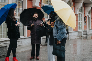 Diverse people meet outdoors, sheltered by umbrellas, discussing ideas and strategies in a rainy...