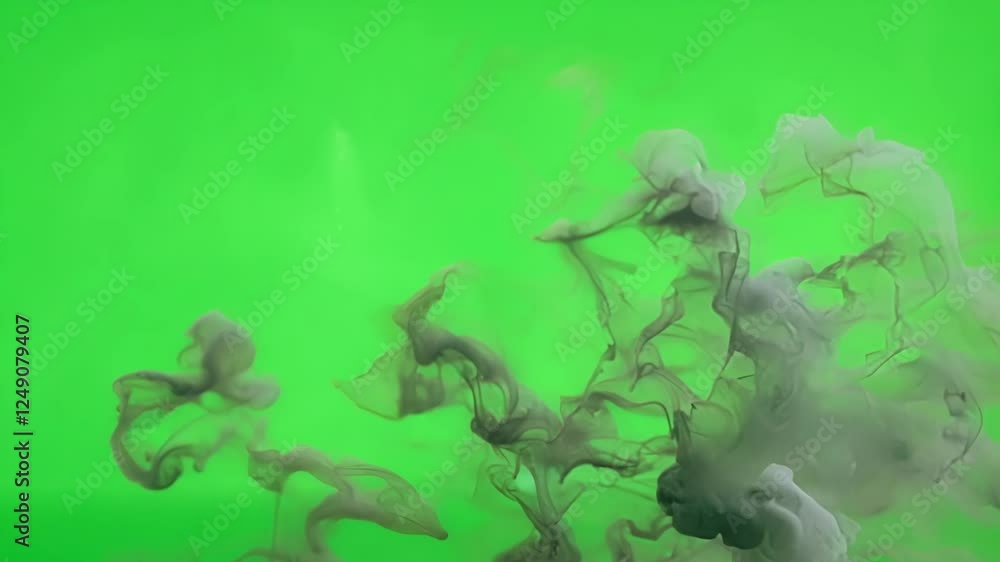 Poster wisps of gray ash dance in the air creating a dynamic texture that stands out against the serene gre