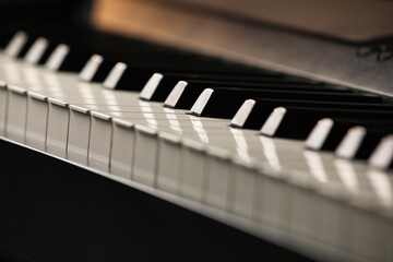 Beautiful piano as background, closeup view. Festive music