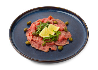 Fresh beef carpaccio with arugula, lemon and capers isolated on white