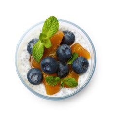 Delicious chia pudding with blueberries, peaches and mint in glass isolated on white, top view