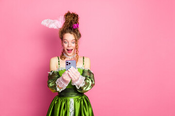 Comparison of modern gadgets and past eras featuring an elegant woman in green baroque costume on pink background