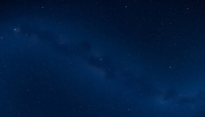 Obraz premium Panorama blue night sky milky way and star on dark background.Universe filled, nebula and galaxy with noise and grain.Photo by long exposure and select white balance.Dark night sky, isometry. with w