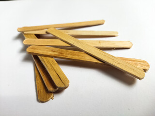 magelang, indonesia 17 february 2025 : some bamboo sticks on a white background.