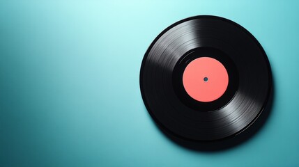 Obraz premium Minimalist Vinyl Record on a Blue Background with a Central Red Label Perfect for Music Lovers and Retro Aesthetic Enthusiasts