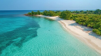Serene tropical beach with clear turquoise waters and lush green vegetation
