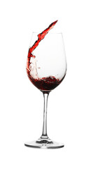 Tasty wine splashing in glass on white background
